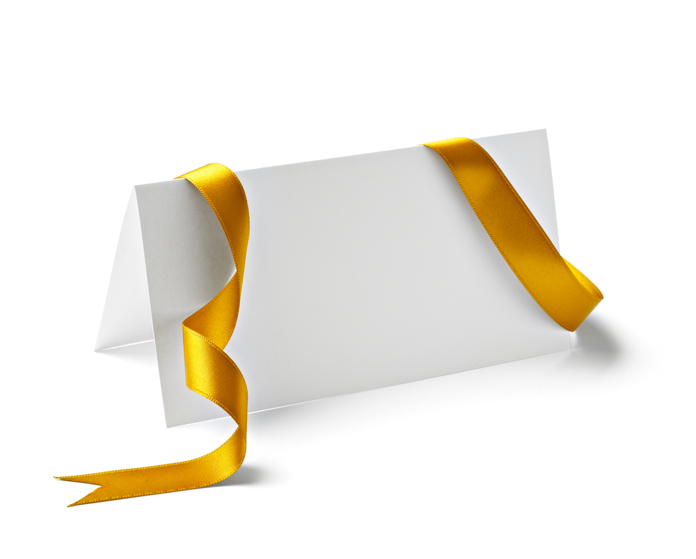 close up of  card note with  ribbon on white background  with clipping path